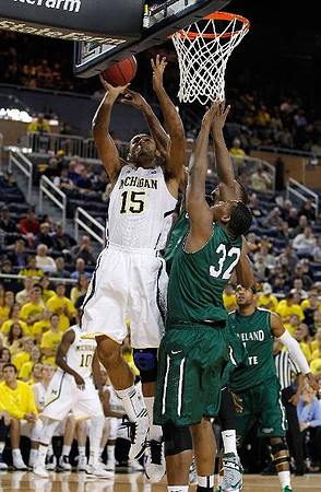 Jon Horford (15) and Tim Hardaway Jr. (10)
