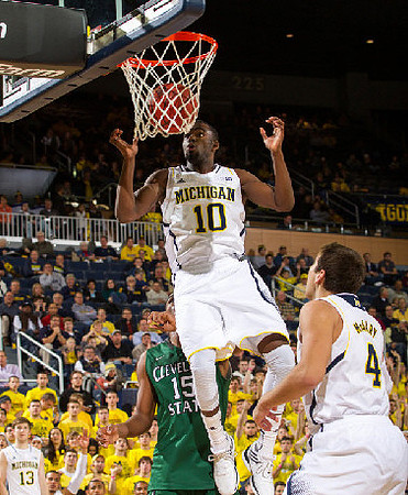 Tim Hardaway Jr. (10), Mitch McGary (4), and Matt Vogrich (13)