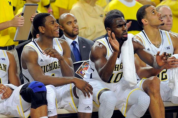 Glenn Robinson III (1), Tim Hardaway Jr. (10), Jordan Morgan (52), and C.J. Lee
