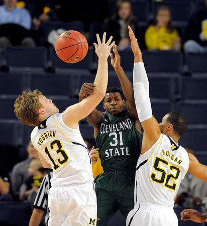 Matt Vogrich (13) and Jordan Morgan (52)