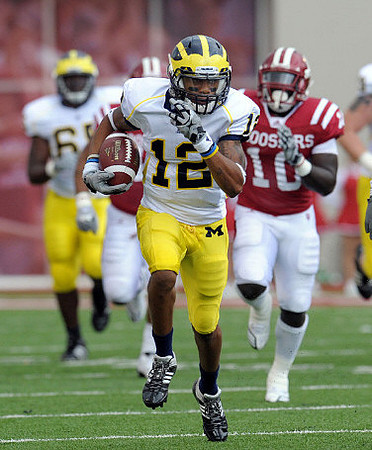 Patrick Omameh (65) and Roy Roundtree (12)
