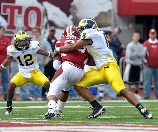 J.T. Floyd (12) and Jonas Mouton (8)