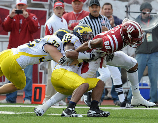 Jordan Kovacs (32) and J.T. Floyd (12)