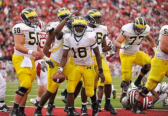 David Molk (50), Patrick Omameh (65), Denard Robinson (16), Kevin Koger (86), and Taylor Lewan (77)