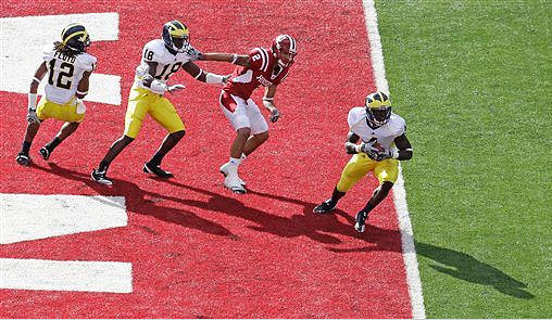 J.T. Floyd (12), James Rogers (18), and Cameron Gordon (4)