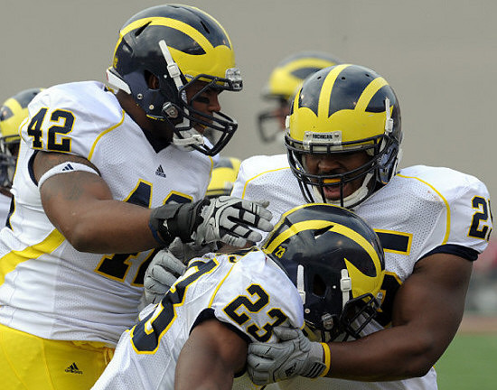J.B. Fitzgerald (42), Floyd Simmons (23), and Kenny Demens (25)