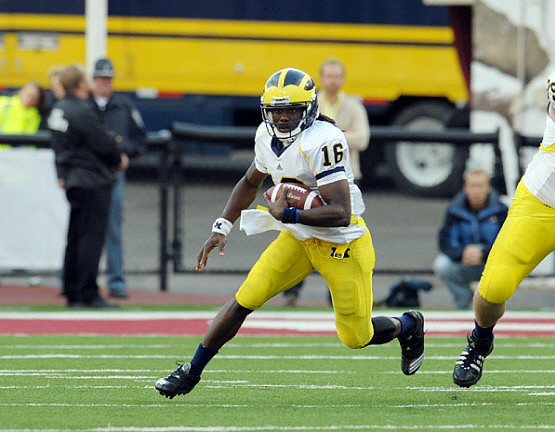 Denard Robinson (16) and Perry Dorrestein (79)