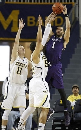 Nik Stauskas (11) and Jordan Morgan (52)
