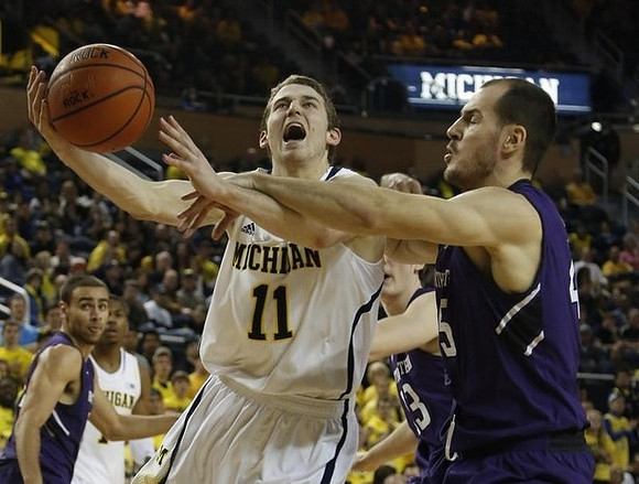 Nik Stauskas (11) and Glenn Robinson III (1)