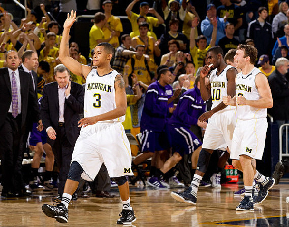 Trey Burke (3), Tim Hardaway Jr. (10), and Zack Novak (0)