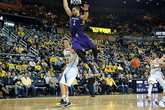Spike Albrecht (2) and Zak Irvin (21)