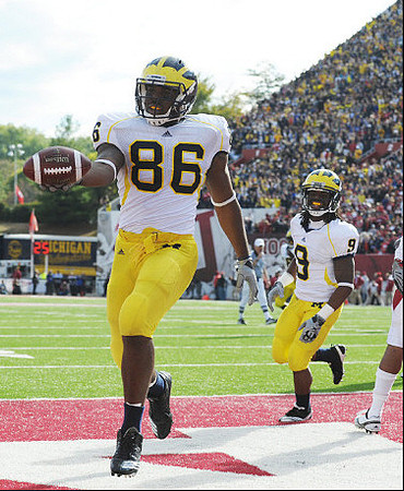 Kevin Koger (86) and Martavious Odoms (9)