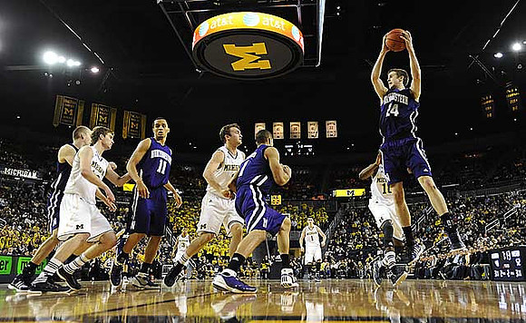 Evan Smotrycz (23), Trey Burke (3), Zack Novak (0), Stu Douglass (1), and Tim Hardaway Jr. (10)