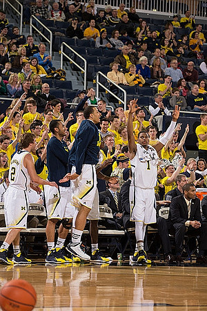 Spike Albrecht (2), Zak Irvin (21), Jordan Morgan (52), Glenn Robinson III (1), and LaVall Jordan