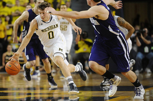 Zack Novak (0) and Jordan Morgan (52)