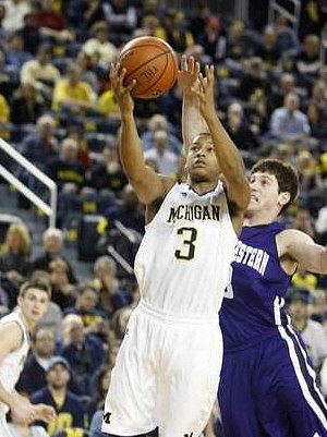 Stu Douglass (1) and Trey Burke (3)