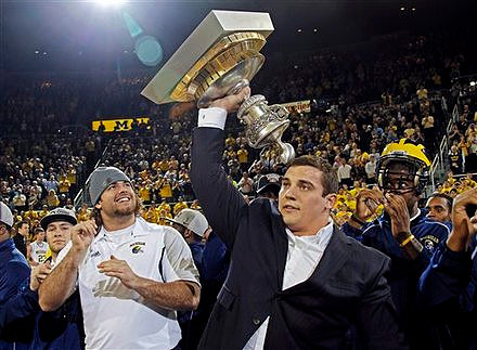 Ryan Van Bergen, David Molk, Kevin Koger, and the Sugar Bowl Trophy