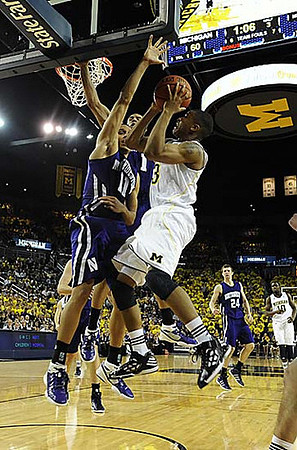 Trey Burke (3) and Tim Hardaway Jr. (10)