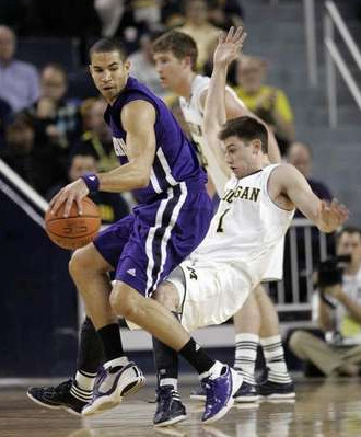 Evan Smotrycz (23) and Stu Douglass (1)