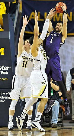 Nik Stauskas (11) and Jordan Morgan (52)
