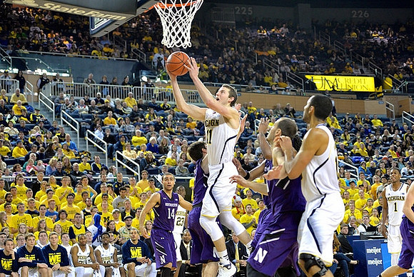 Nik Stauskas (11), Jon Horford (15), Caris LeVert (23), and Glenn Robinson III (1)