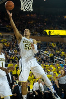 Glenn Robinson III (1) and Jordan Morgan (52)