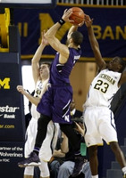 Nik Stauskas (11) and Caris LeVert (23)