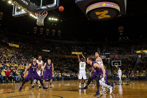 Glenn Robinson III (1), Derrick Walton Jr. (10), Jordan Morgan (52), and Nik Stauskas (11)