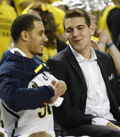 Jordan Morgan (52) and Mitch McGary (4)