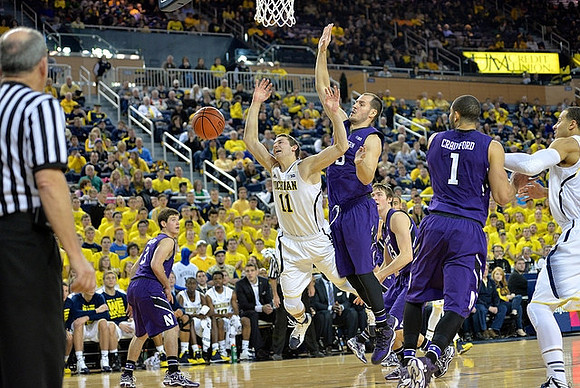 Nik Stauskas (11) and Jordan Morgan (52)
