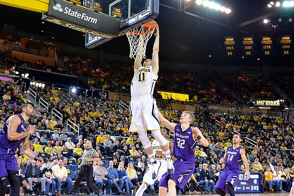 Nik Stauskas (11) and Zak Irvin (21)