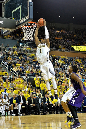 Glenn Robinson III (1) and Jon Horford (15)