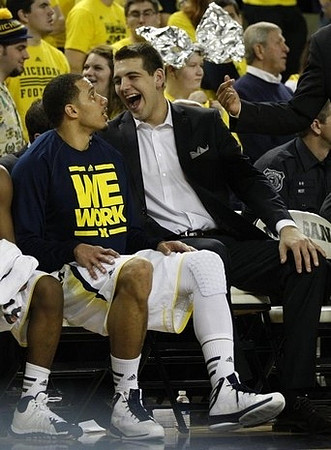 Jordan Morgan (52) and Mitch McGary (4)