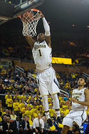 Glenn Robinson III (1) and Jon Horford (15)