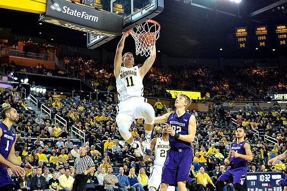 Nik Stauskas (11) and Zak Irvin (21)