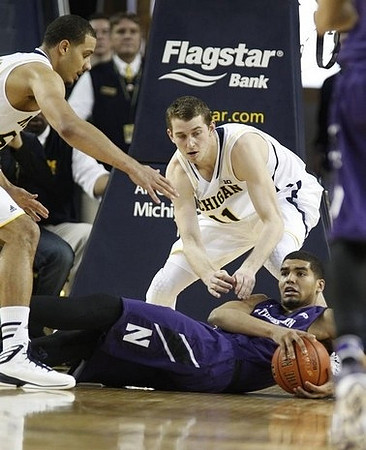 Jordan Morgan (52) and Nik Stauskas (11)