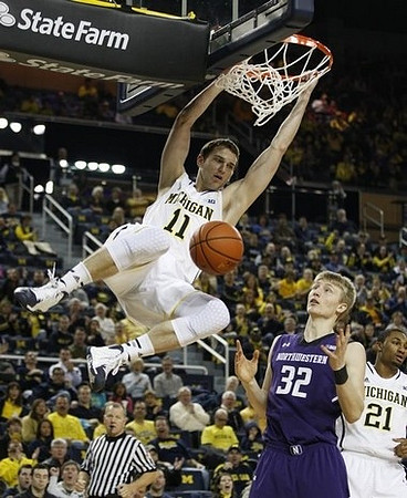 Nik Stauskas (11) and Zak Irvin (21)