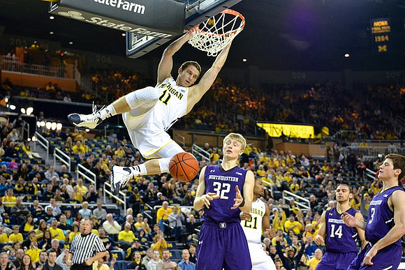 Nik Stauskas (11) and Zak Irvin (21)