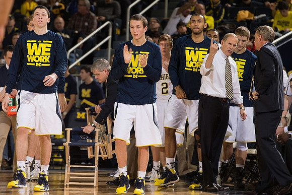 Sean Lonergan (20), Andrew Dakich (5), Spike Albrecht (2), Jon Horford (15), and Jeff Meyer