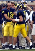 Matt Gutierrez (12) and Chad Henne (7)