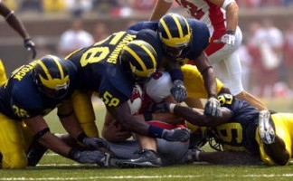 Scott McClintock (35), Roy Manning (58), Leon Hall (2), and Pierre Woods (99)