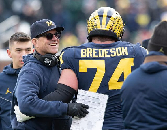 Jim Harbaugh and Ben Bredeson (74)
