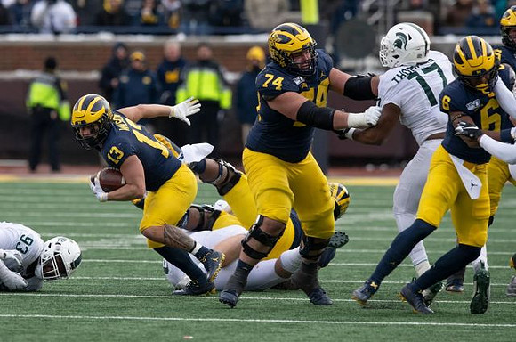 Tru Wilson (13), Ben Bredeson (74), and Cornelius Johnson (6)