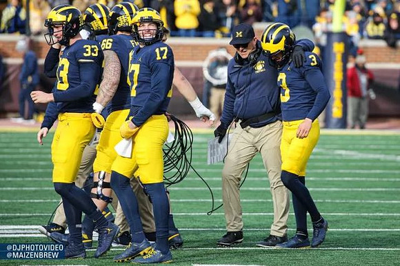Camaron Cheeseman (33), Chuck Filiaga (66), Will Hart (17), Jim Harbaugh, and Quinn Nordin (3)