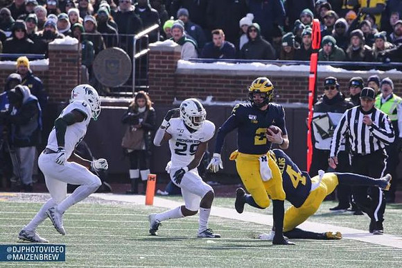 Shea Patterson (2) and Nico Collins (4)