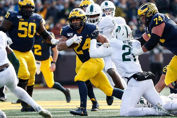 Michael Onwenu (50), Shea Patterson (2), Zach Charbonnet (24), and Ben Bredeson (74)