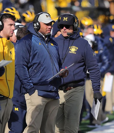 Josh Gattis and Jim Harbaugh