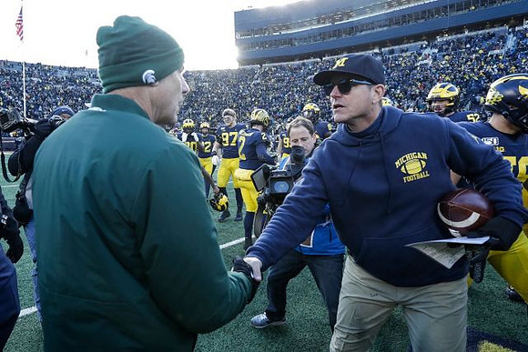 Michigan State Head Coach Mark Dantonio and Jim Harbaugh