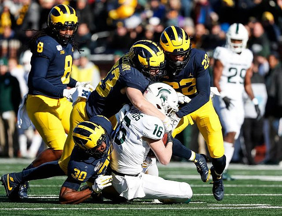 Devin Gil (8), Daxton Hill (30), Andrew Russell (43), and Gemon Green (22)