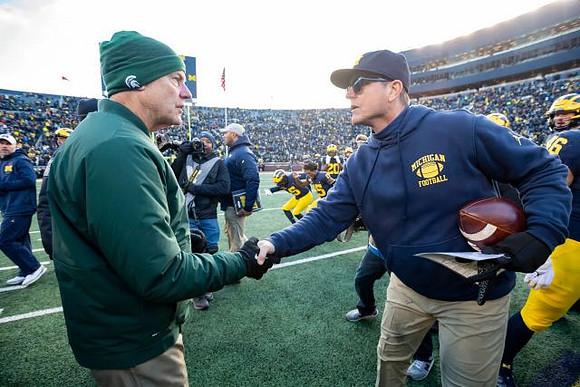 Michigan State Head Coach Mark Dantonio and Jim Harbaugh